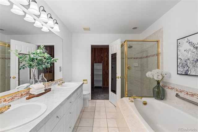 9491 Southern Hills Cir, Lone Tree, CO 80124 - full bath featuring a stall shower, double vanity, a bath, and tile patterned flooring