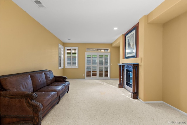 9491 Southern Hills Cir, Lone Tree, CO 80124 - carpeted living room featuring a glass covered fireplace and recessed lighting