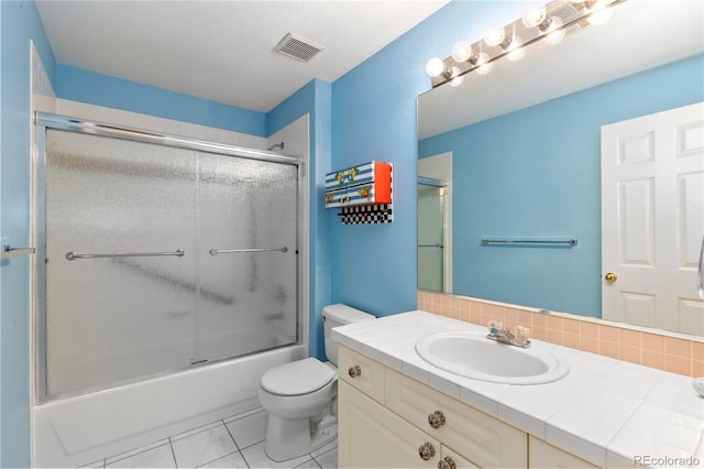 9491 Southern Hills Cir, Lone Tree, CO 80124 - bathroom with vanity, decorative backsplash, and combined bath / shower with glass door