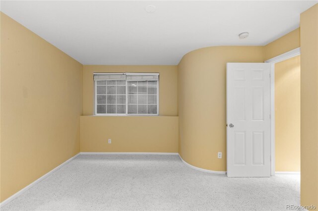 9491 Southern Hills Cir, Lone Tree, CO 80124 - empty room featuring baseboards and a smoke detector