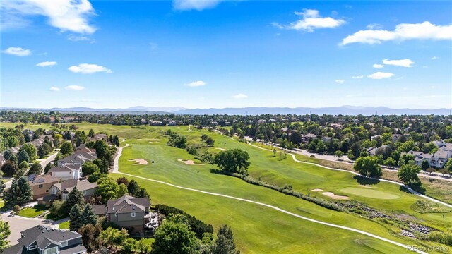9491 Southern Hills Cir, Lone Tree, CO 80124 - aerial perspective of suburban area featuring a mountain backdrop and a golf club