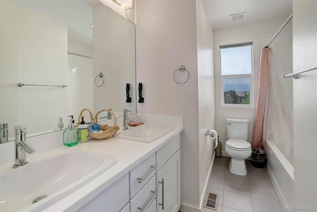 10906 Touchstone Loop, Parker, CO 80134 - full bathroom featuring tile patterned flooring, double vanity, toilet, baseboards, and shower / bath combination with curtain