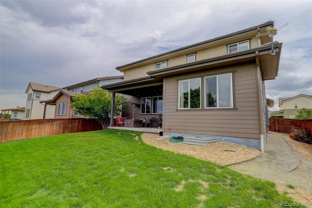 10906 Touchstone Loop, Parker, CO 80134 - rear view of house with a patio