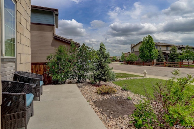 10906 Touchstone Loop, Parker, CO 80134 - view of yard featuring a patio area