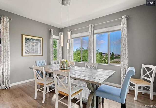 10906 Touchstone Loop, Parker, CO 80134 - dining room with wood finished floors