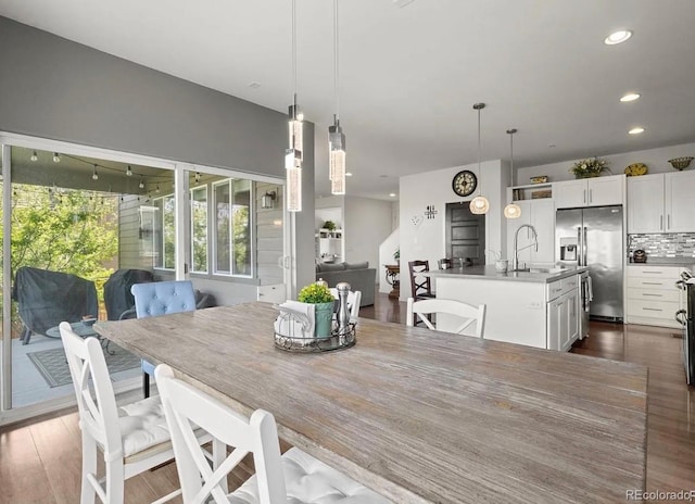 10906 Touchstone Loop, Parker, CO 80134 - dining space featuring recessed lighting and dark wood-type flooring