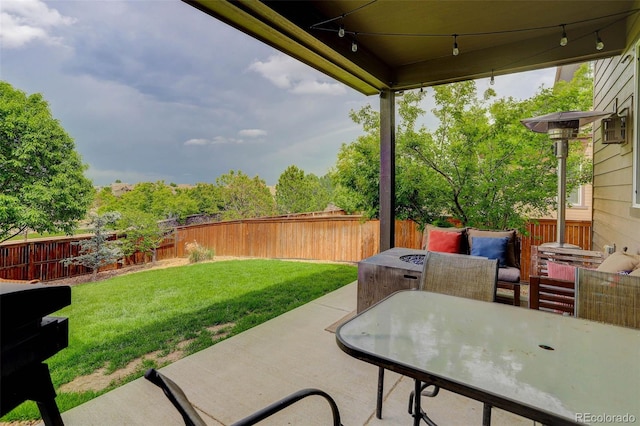 10906 Touchstone Loop, Parker, CO 80134 - fenced backyard featuring a patio and outdoor dining area