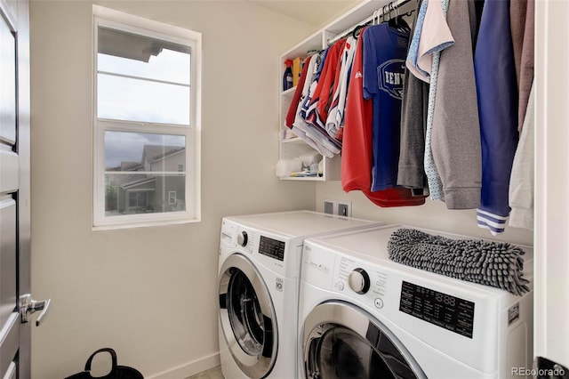 10906 Touchstone Loop, Parker, CO 80134 - laundry room featuring washer and dryer and baseboards