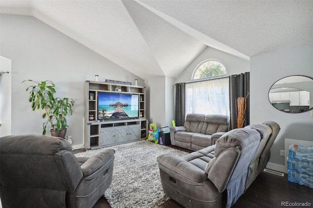 21111 E 43rd Ave, Denver, CO 80249 - living room featuring lofted ceiling, dark wood-style flooring, and baseboards
