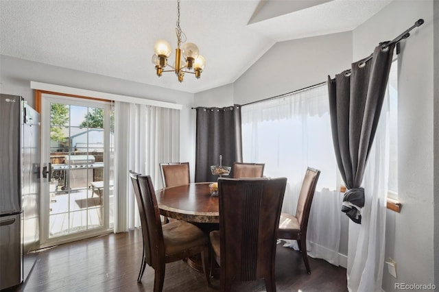 21111 E 43rd Ave, Denver, CO 80249 - dining room with vaulted ceiling, a chandelier, and dark wood-style flooring