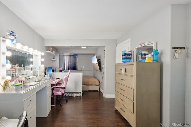 21111 E 43rd Ave, Denver, CO 80249 - office area featuring dark wood-style floors and baseboards