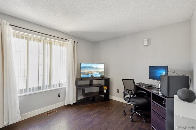 21111 E 43rd Ave, Denver, CO 80249 - office featuring wood finished floors, baseboards, and a textured ceiling