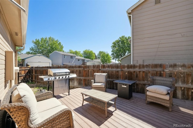 21111 E 43rd Ave, Denver, CO 80249 - wooden deck featuring area for grilling and fence