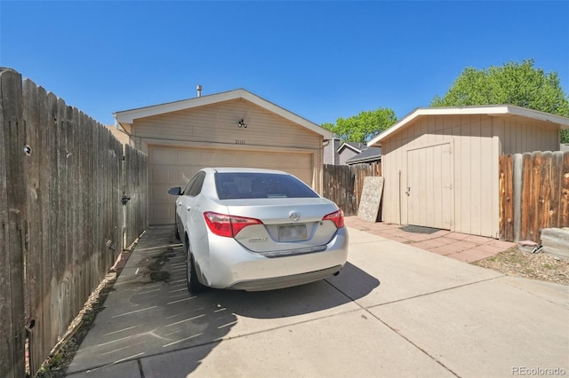 21111 E 43rd Ave, Denver, CO 80249 - detached garage featuring fence