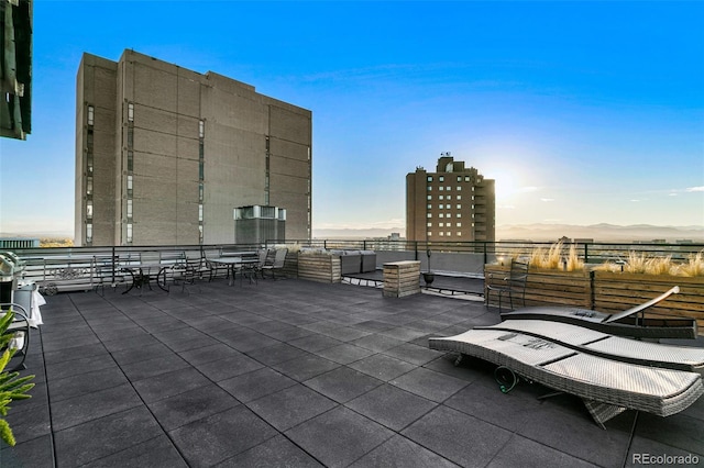 view of patio terrace at dusk