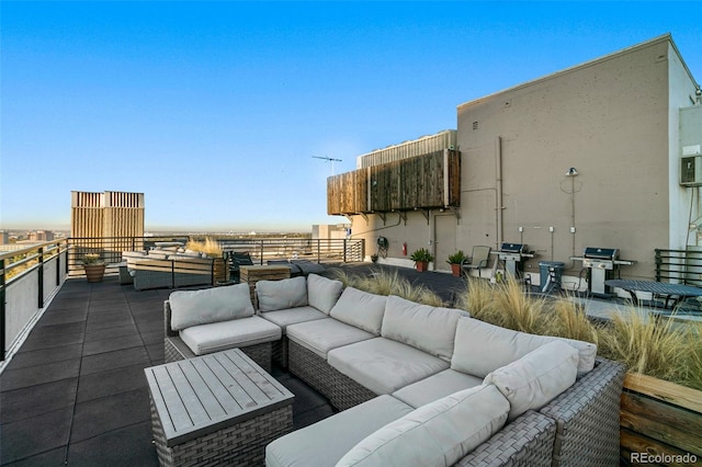 view of patio / terrace featuring a balcony, an outdoor living space, and area for grilling