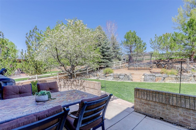 view of patio with outdoor dining space
