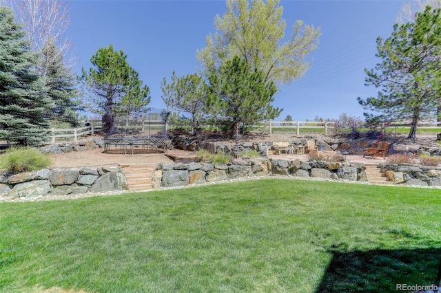 view of yard featuring fence