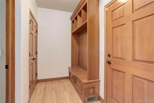 12825 W 81st Ave, Arvada, CO 80005 - mudroom featuring light wood finished floors and baseboards
