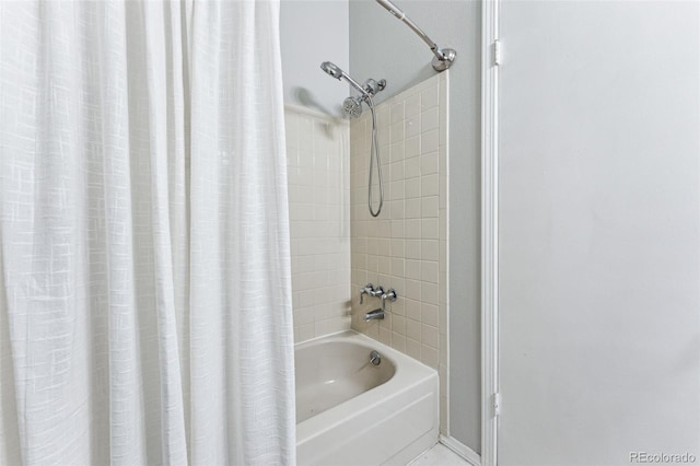 bathroom featuring shower / tub combo with curtain