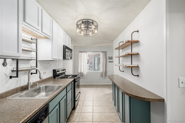 6005 W 39th Ave Unit 6005, Wheat Ridge, CO 80033 - kitchen featuring a sink, white cabinetry, open shelves, dark countertops, and appliances with stainless steel finishes