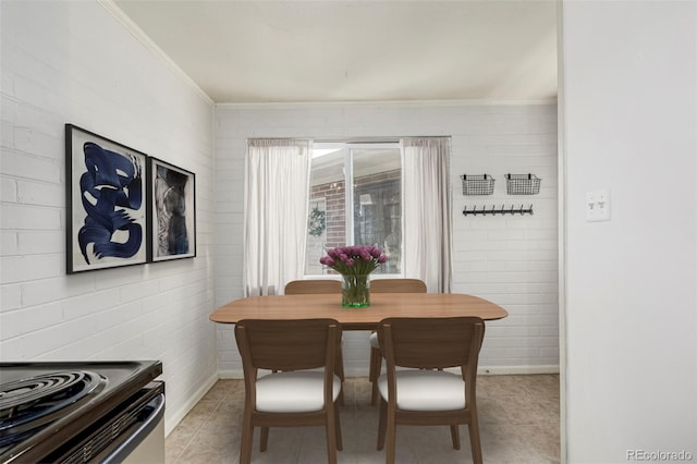 6005 W 39th Ave Unit 6005, Wheat Ridge, CO 80033 - dining area featuring crown molding and light tile patterned flooring