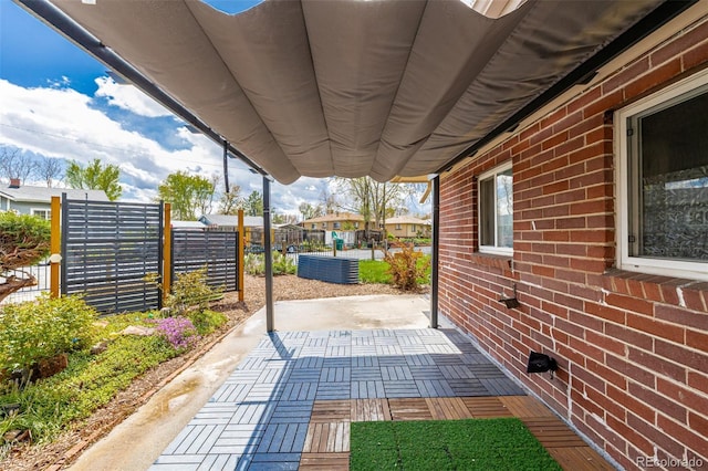 6005 W 39th Ave Unit 6005, Wheat Ridge, CO 80033 - view of patio / terrace featuring fence