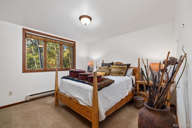82 Lenawee Ln, Dillon, CO 80435 - bedroom featuring a baseboard radiator, baseboards, and carpet floors