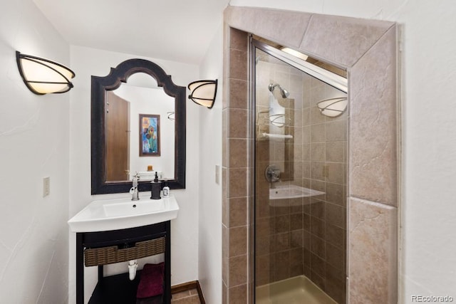 82 Lenawee Ln, Dillon, CO 80435 - full bath featuring a shower stall, vanity, and baseboards