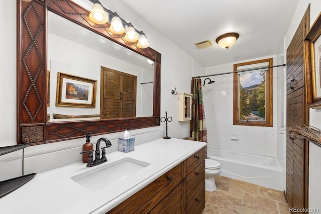 82 Lenawee Ln, Dillon, CO 80435 - bathroom featuring toilet, vanity, and shower / bath combination with curtain