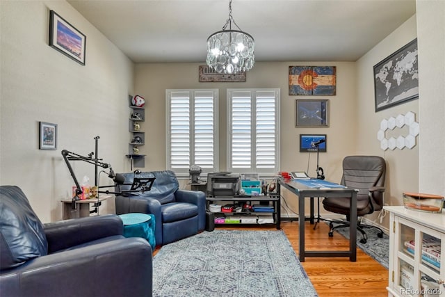 4544 Portillo Pl, Colorado Springs, CO 80924 - office area featuring a chandelier and light wood-type flooring