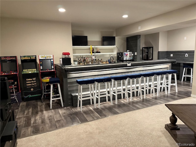 4544 Portillo Pl, Colorado Springs, CO 80924 - bar featuring recessed lighting, wet bar, and wood finished floors