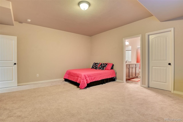 4544 Portillo Pl, Colorado Springs, CO 80924 - bedroom with baseboards, ensuite bathroom, and carpet