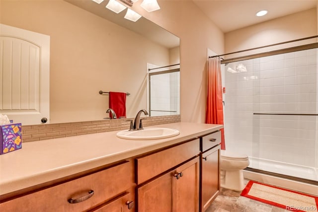 4544 Portillo Pl, Colorado Springs, CO 80924 - bathroom with toilet, vanity, and a stall shower