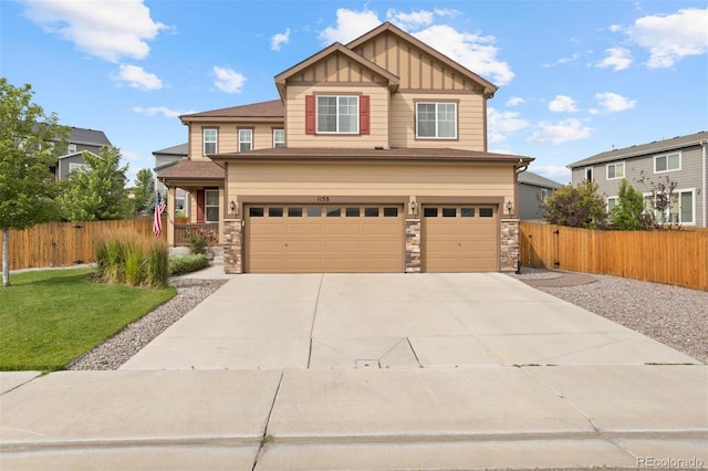 craftsman-style home with a garage