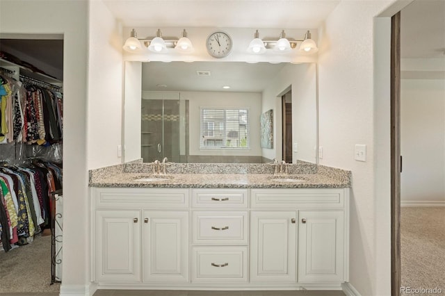 bathroom featuring double vanity