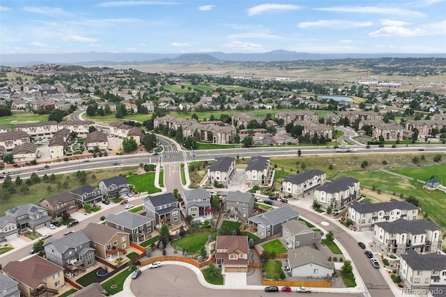 birds eye view of property featuring a mountain view