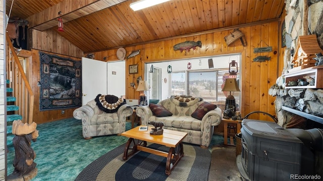 living room featuring lofted ceiling with beams, wood walls, and wooden ceiling