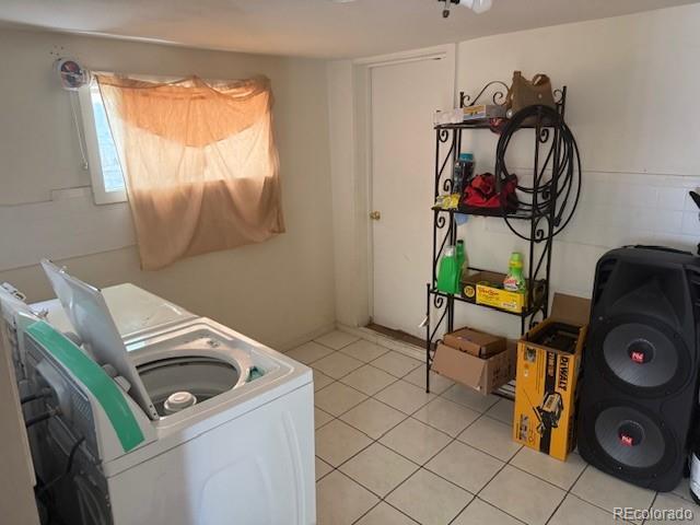 449 Lowell Blvd, Denver, CO 80204 - washroom featuring light tile patterned floors and washing machine and dryer