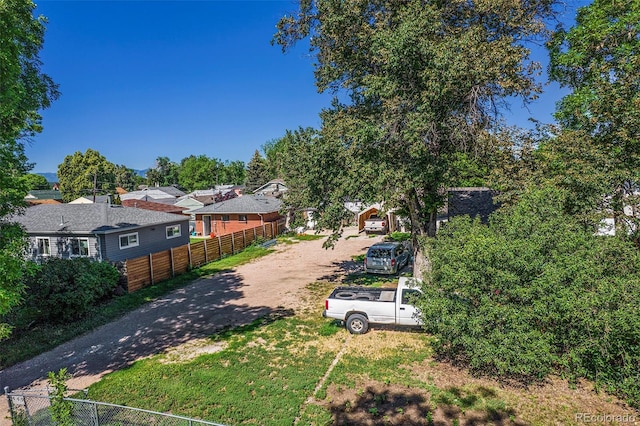449 Lowell Blvd, Denver, CO 80204 - view of yard featuring driveway and a residential view