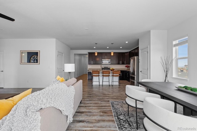 17960 Weymouth Ave, Parker, CO 80134 - living room featuring dark wood-type flooring and recessed lighting