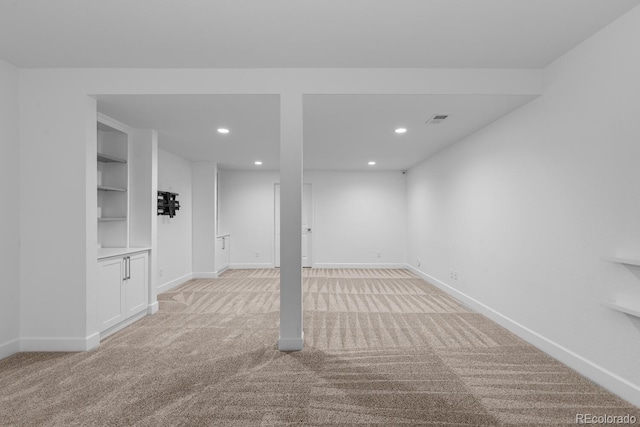 17960 Weymouth Ave, Parker, CO 80134 - finished below grade area with light colored carpet, recessed lighting, and built in shelves