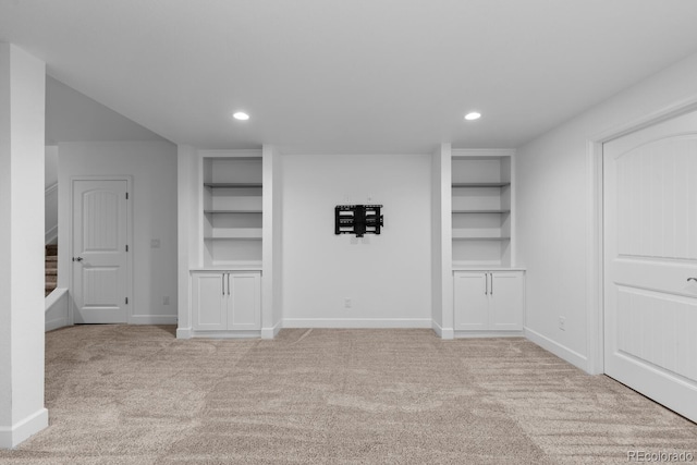 17960 Weymouth Ave, Parker, CO 80134 - below grade area featuring built in features, carpet, and recessed lighting