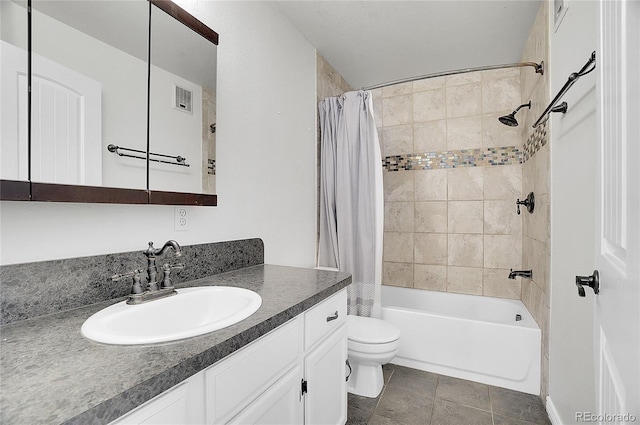 full bathroom with tile patterned flooring, vanity, toilet, and shower / bath combo