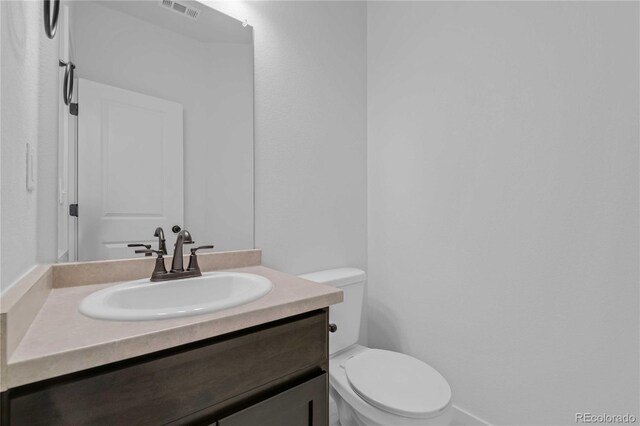 827 Forest Canyon Rd, Severance, CO 80550 - bathroom featuring vanity and toilet