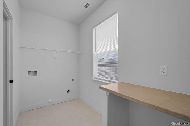 827 Forest Canyon Rd, Severance, CO 80550 - laundry room with electric dryer hookup, hookup for a washing machine, baseboards, and hookup for a gas dryer