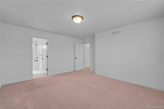 827 Forest Canyon Rd, Severance, CO 80550 - unfurnished bedroom featuring light carpet, baseboards, and connected bathroom