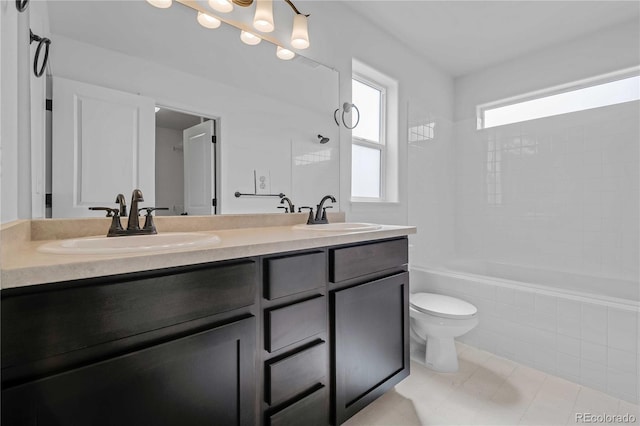 827 Forest Canyon Rd, Severance, CO 80550 - bathroom with toilet, double vanity, and tiled shower / bath combo
