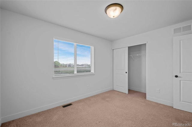 827 Forest Canyon Rd, Severance, CO 80550 - unfurnished bedroom with light carpet, baseboards, and a closet