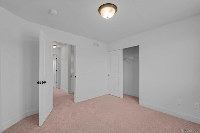 827 Forest Canyon Rd, Severance, CO 80550 - unfurnished bedroom with light carpet, baseboards, and a closet